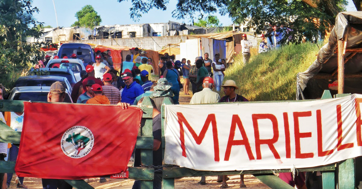 marielle vive foto mst home — ADunicamp repudia decisão judicial que autoriza despejo de 450 famílias do acampamento Marielle Vive! — ADunicamp